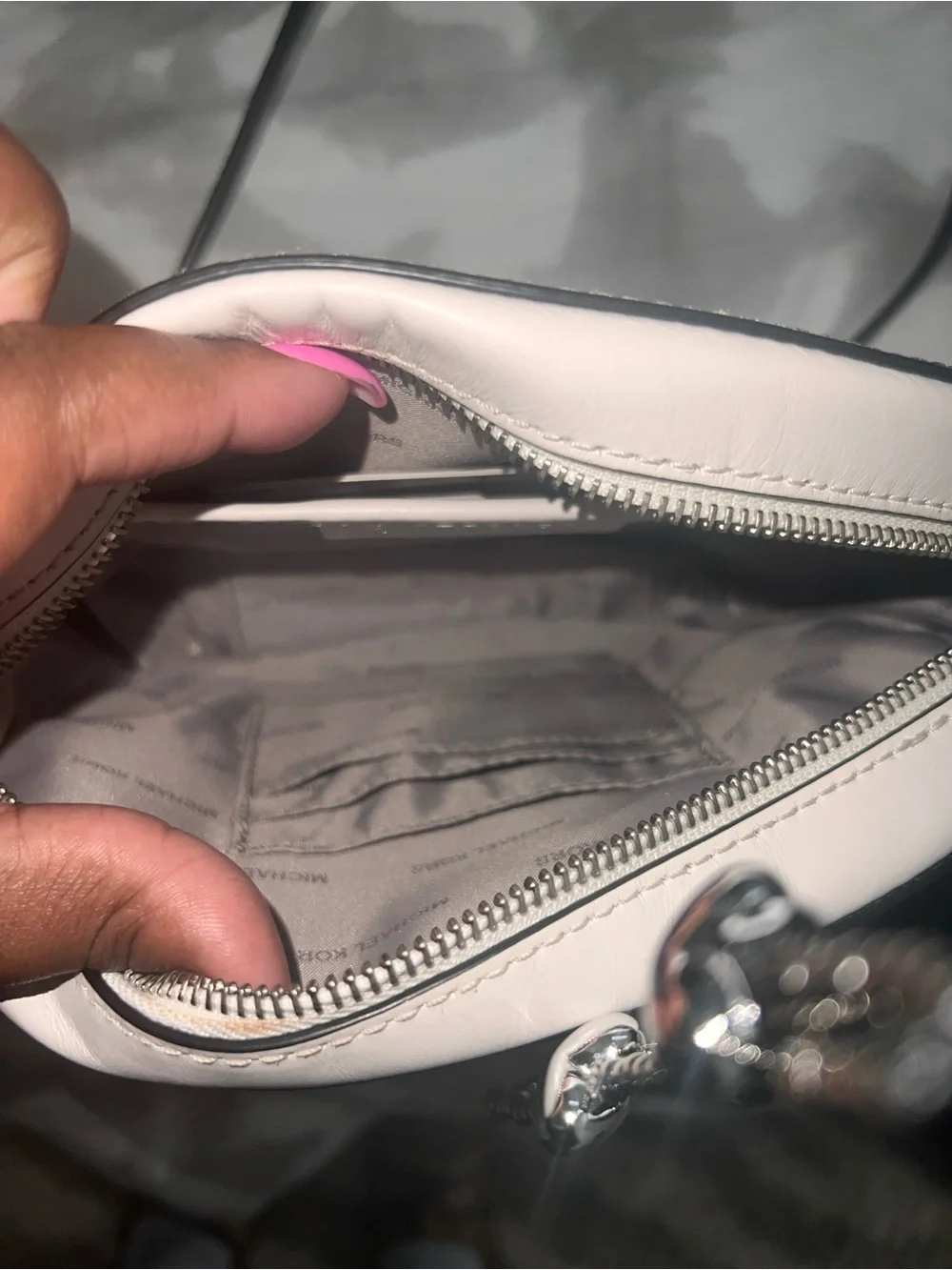 Michael Kors Silver Oval Leather Crossbody with Tassel